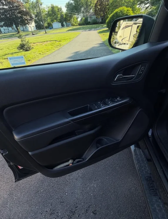 A cleaned interior door panel